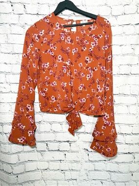 Selfie. Rust colored top. Size L